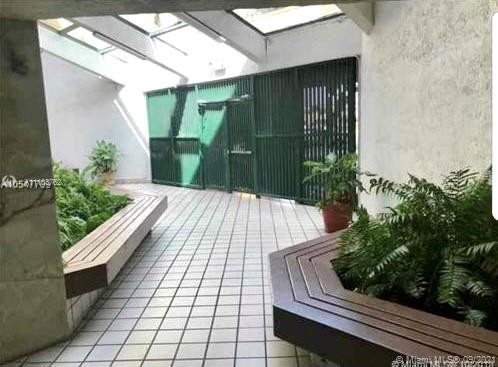 11790 Southwest 18th Street, Unit 1073 Miami, FL 33175 - Photo 2 of 18 a view of backyard with garden