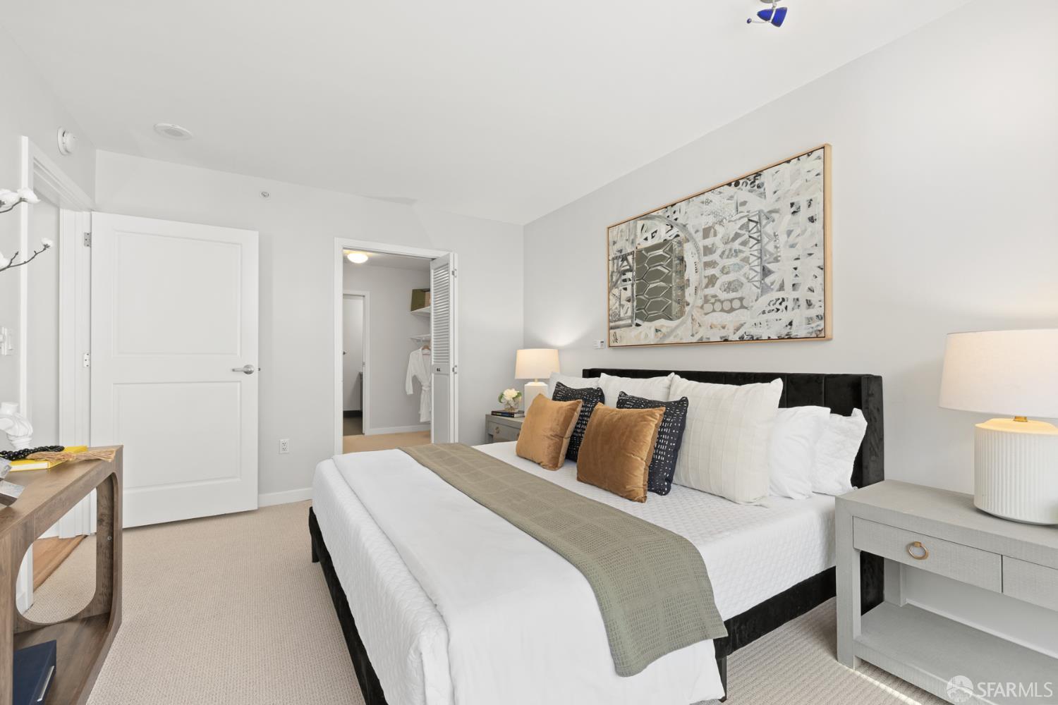 177 Townsend Street, Unit 728 San Francisco, CA 94107 - Photo 12 of 39 a bedroom with bed and cupboard