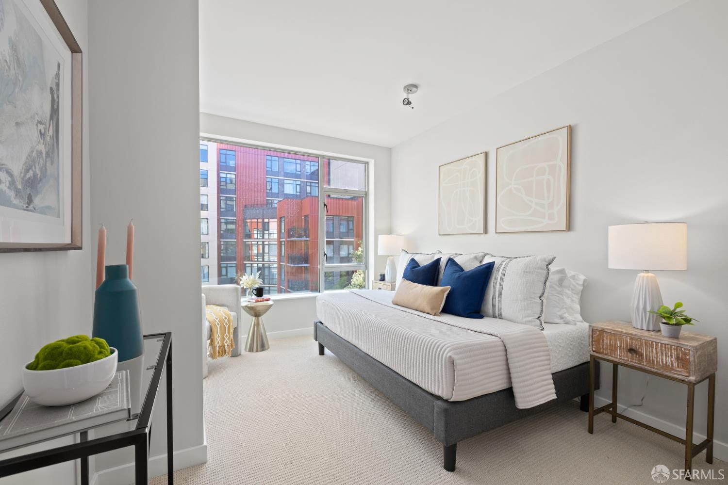 177 Townsend Street, Unit 728 San Francisco, CA 94107 - Photo 16 of 39 a bedroom with a bed and a table