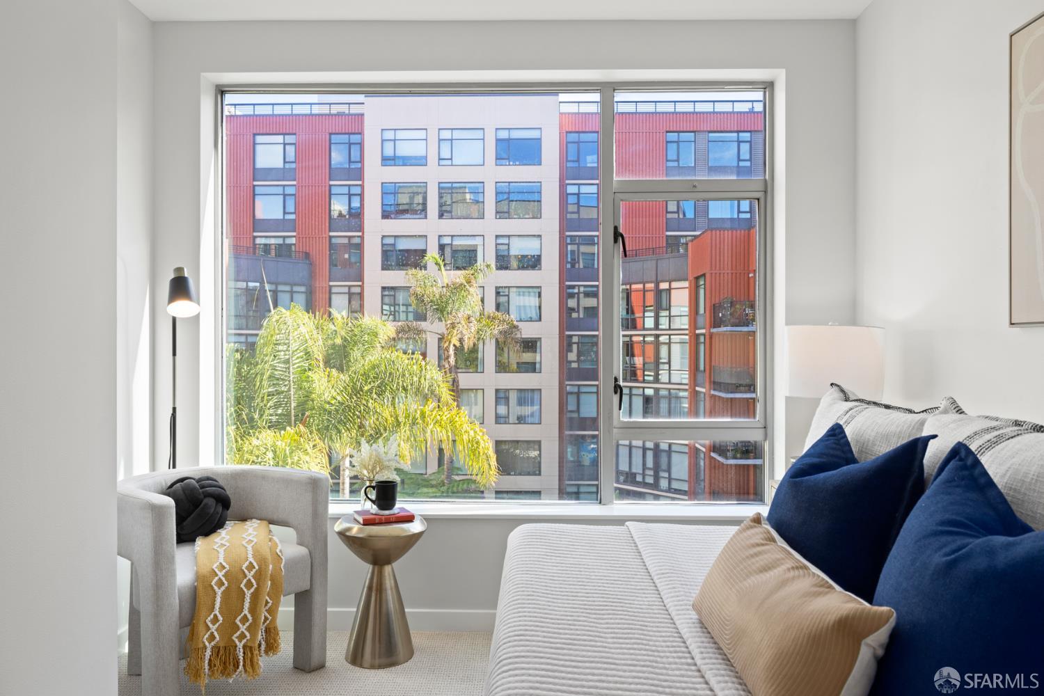 177 Townsend Street, Unit 728 San Francisco, CA 94107 - Photo 17 of 39 a living room with furniture and a large window
