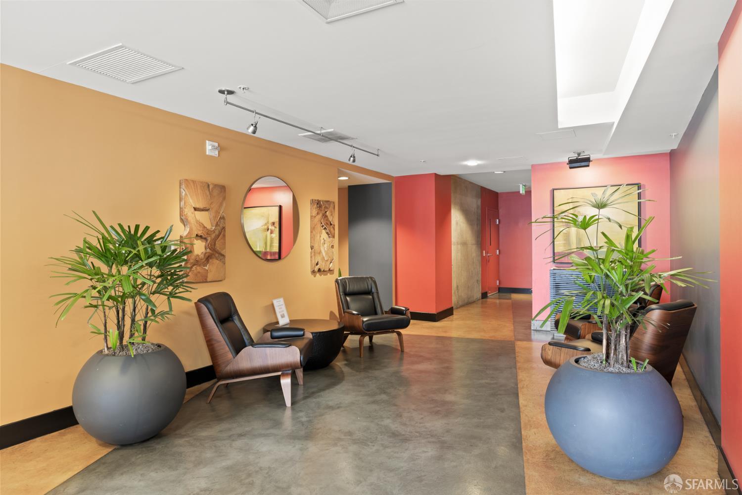 177 Townsend Street, Unit 728 San Francisco, CA 94107 - Photo 25 of 39 a living room with furniture and a potted plant