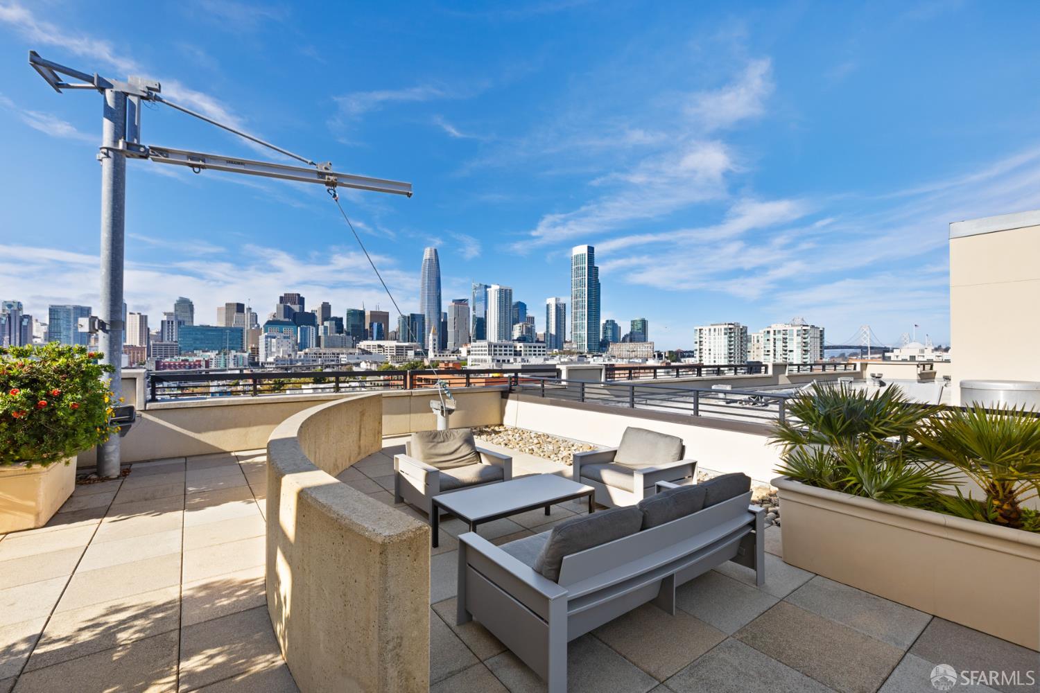 177 Townsend Street, Unit 728 San Francisco, CA 94107 - Photo 29 of 39 a view of swimming pool with outdoor seating and plants