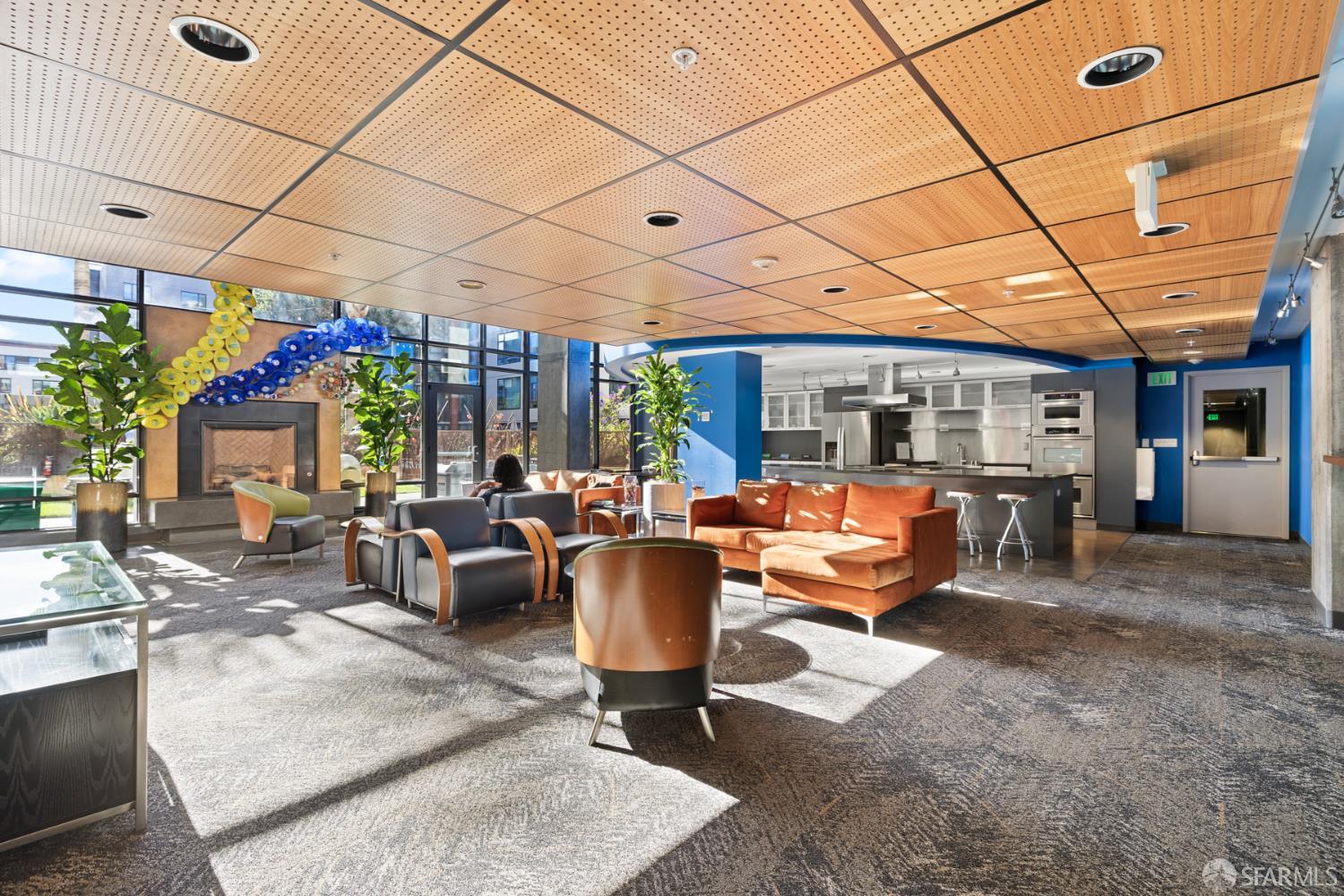 177 Townsend Street, Unit 728 San Francisco, CA 94107 - Photo 31 of 39 a living room with patio furniture and a potted plant