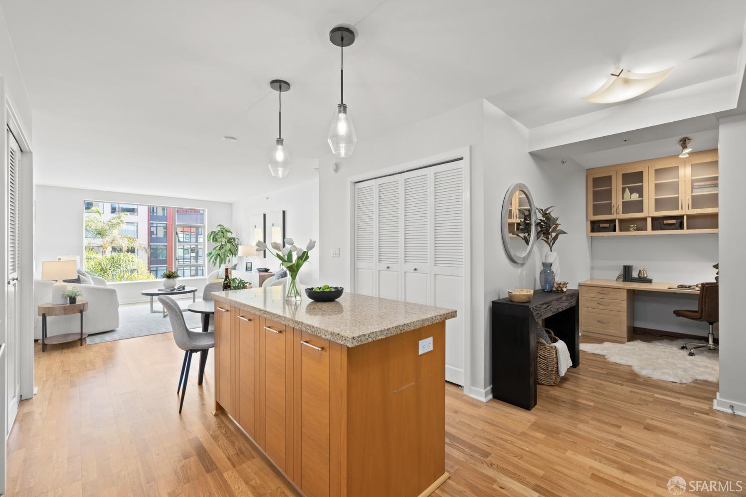 177 Townsend Street, Unit 728 San Francisco, CA 94107 - Photo 5 of 39 a view of a kitchen counter space and wooden floor