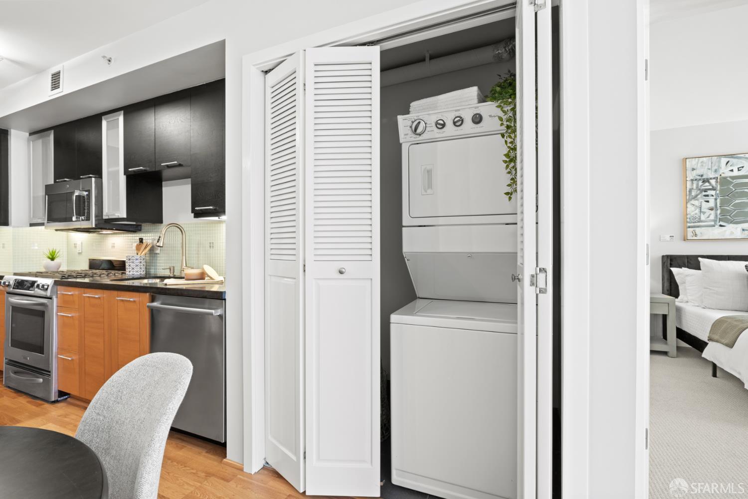 177 Townsend Street, Unit 728 San Francisco, CA 94107 - Photo 9 of 39 a view of kitchen with washer and dryer