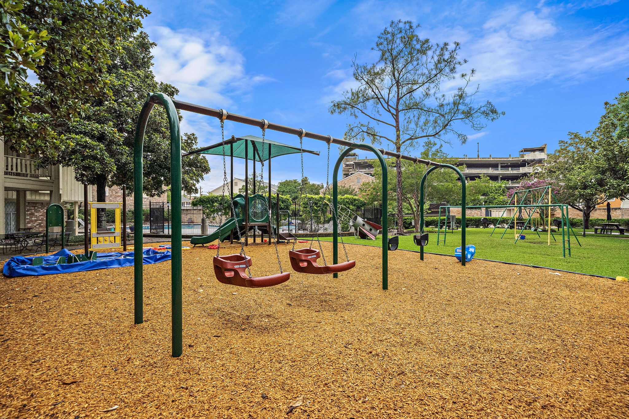 6452 Burgoyne Road, Unit 100 Houston, TX 77057 - Photo 36 of 44 a view of a park with slide