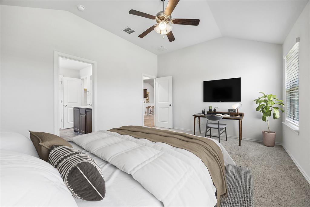 3807 Dogwood Road Melissa, TX 75454 - Photo 21 of 38 a bedroom with a bed and a flat screen tv