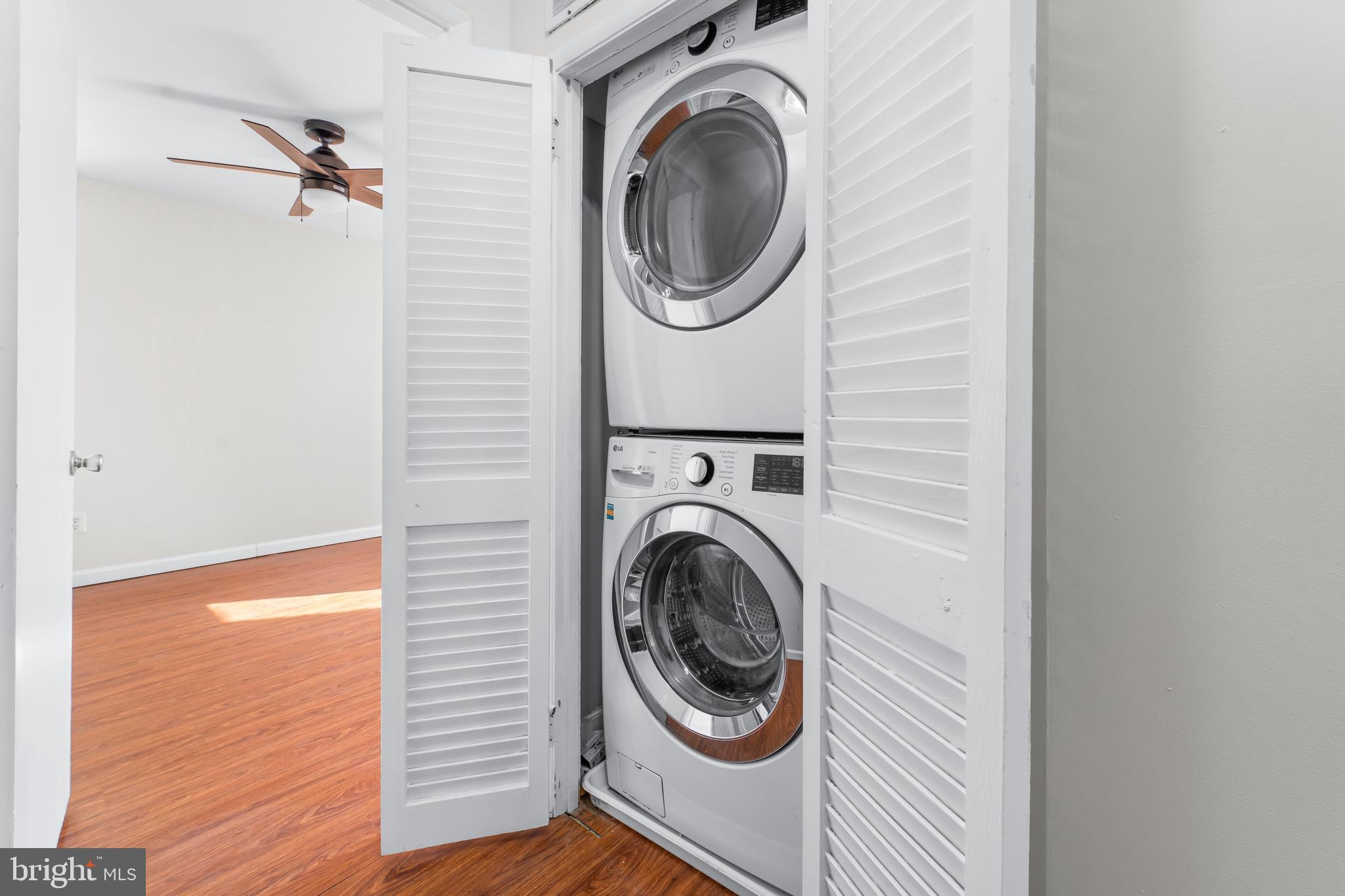 3340 Huntley Square Drive, Unit A Temple Hills, MD 20748 - Photo 11 of 19 a utility room with dryer and washer