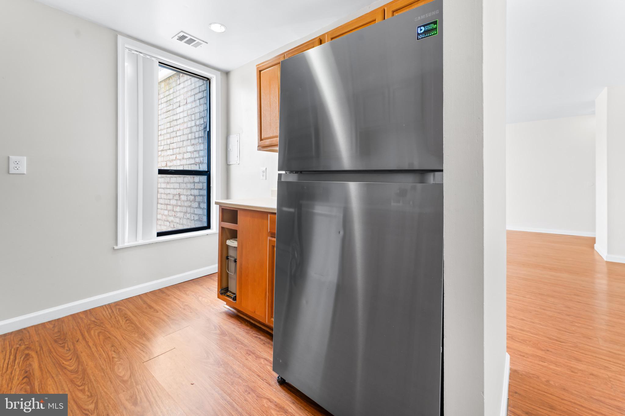 3340 Huntley Square Drive, Unit A Temple Hills, MD 20748 - Photo 15 of 19 a view of empty room with wooden floor and fan