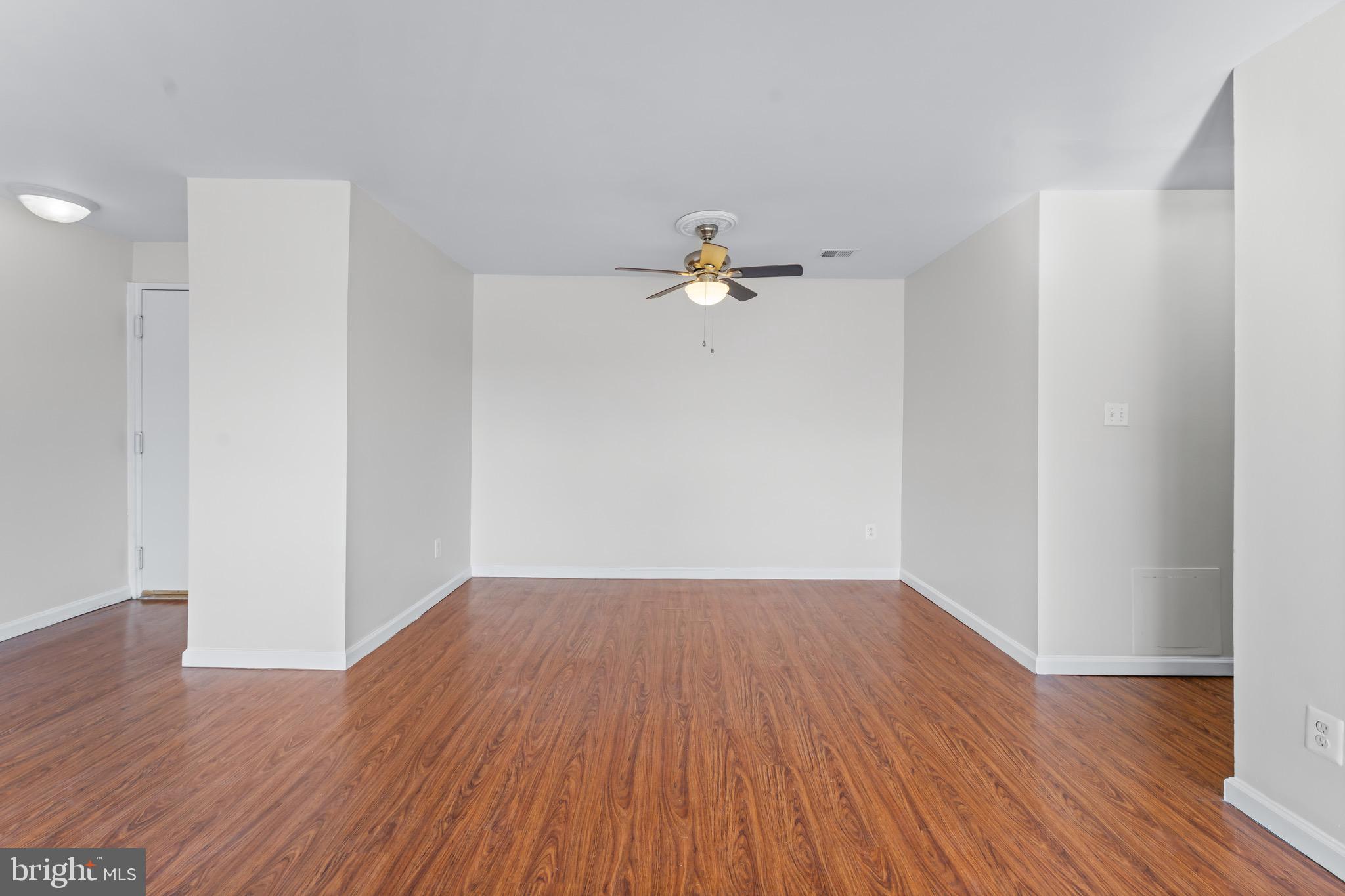 3340 Huntley Square Drive, Unit A Temple Hills, MD 20748 - Photo 8 of 19 a view of a room with wooden floor
