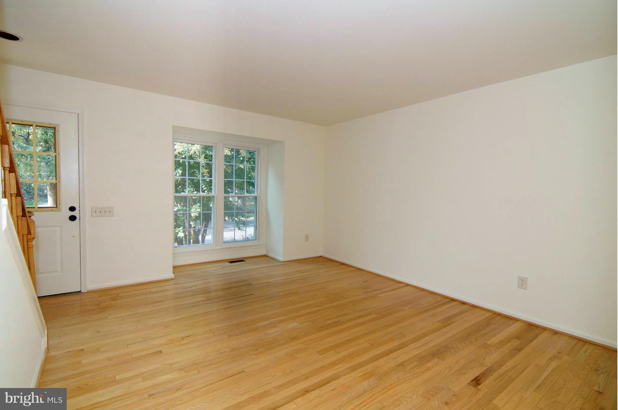 6581 Cypress Point Road Alexandria, VA 22312 - Photo 10 of 29 Living Room/Dining Room View 1