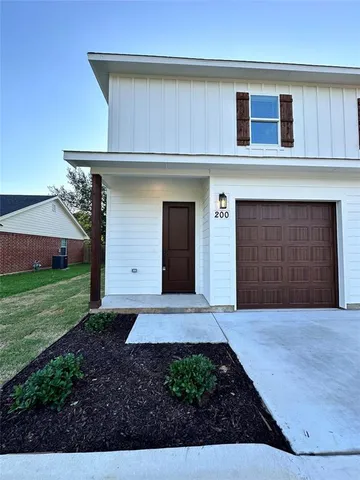 a front view of house with yard