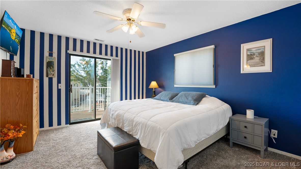 783 Winn Road, Unit 5F Osage Beach, MO 65065 - Photo 11 of 37 Primary with bedroom with private bath.