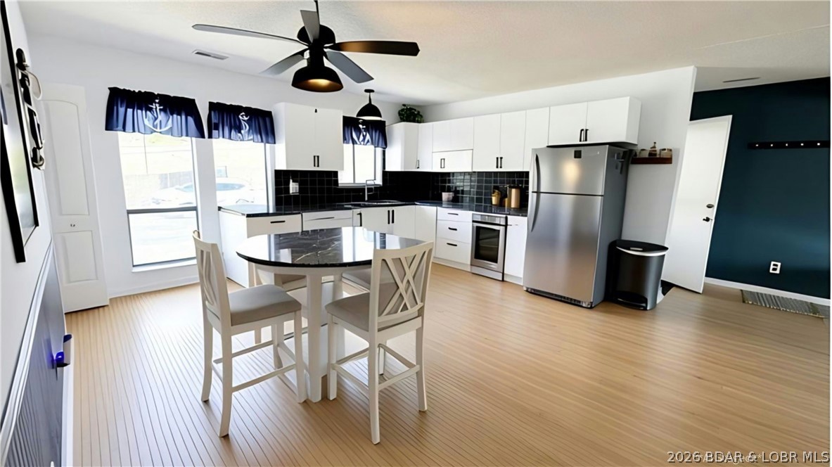 783 Winn Road, Unit 5F Osage Beach, MO 65065 - Photo 5 of 37 Open kitchen and living room - this is what the ki