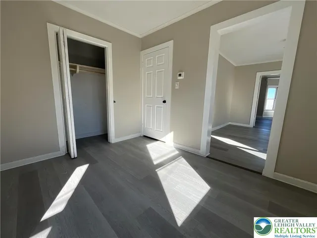 a view of an empty room and window