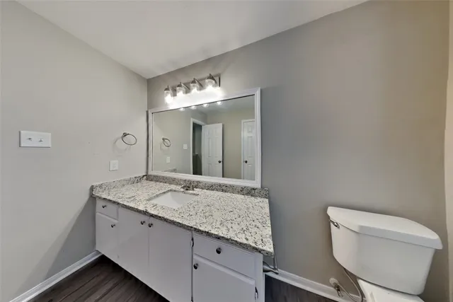 a bathroom with a bathtub and a toilet