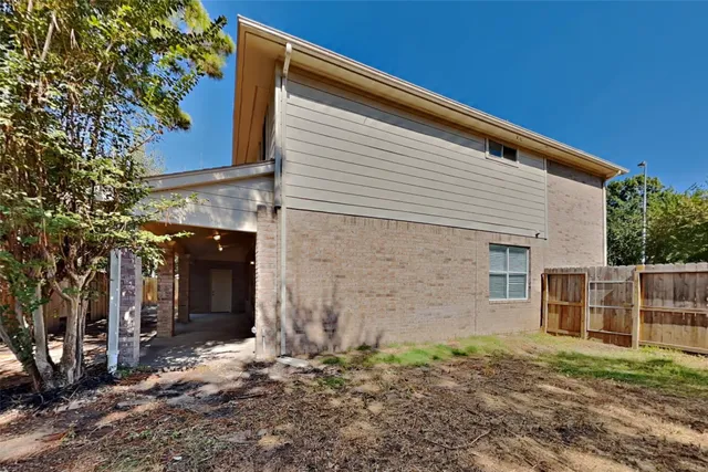 a picture of a cabinet with a white wall and a white wall