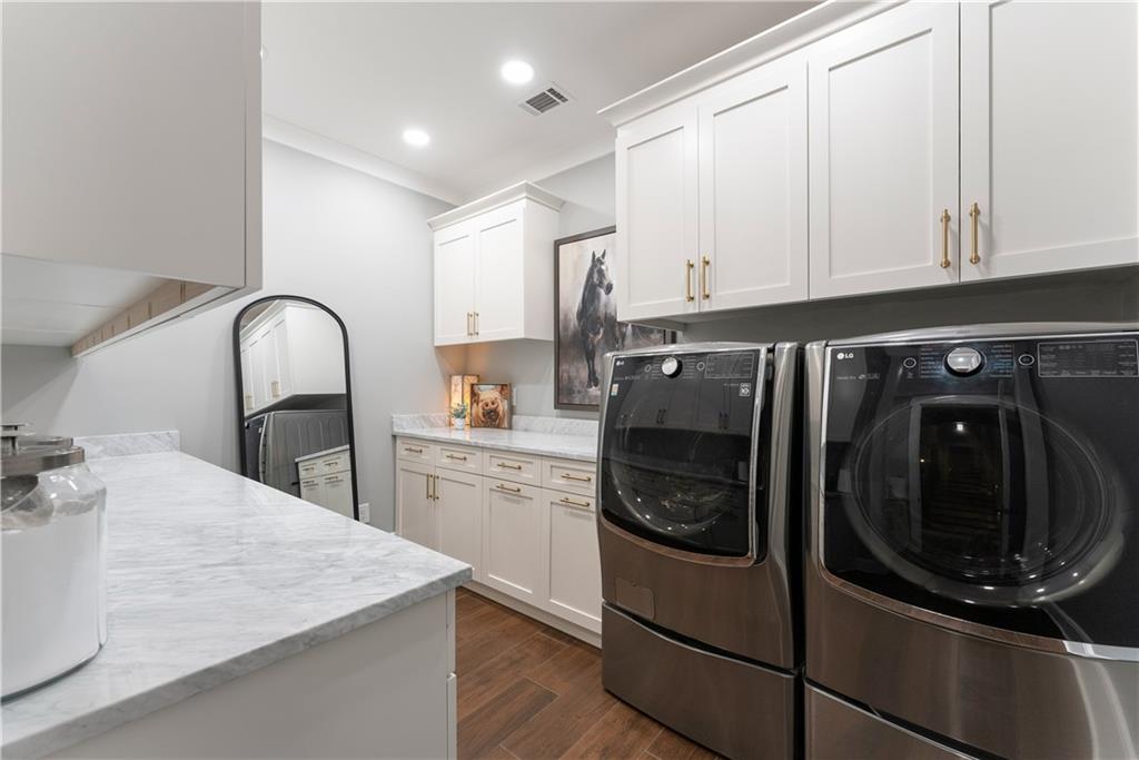 4601 North Browning Bridge Road Gainesville, GA 30506 - Photo 46 of 80 a kitchen with a refrigerator and a sink