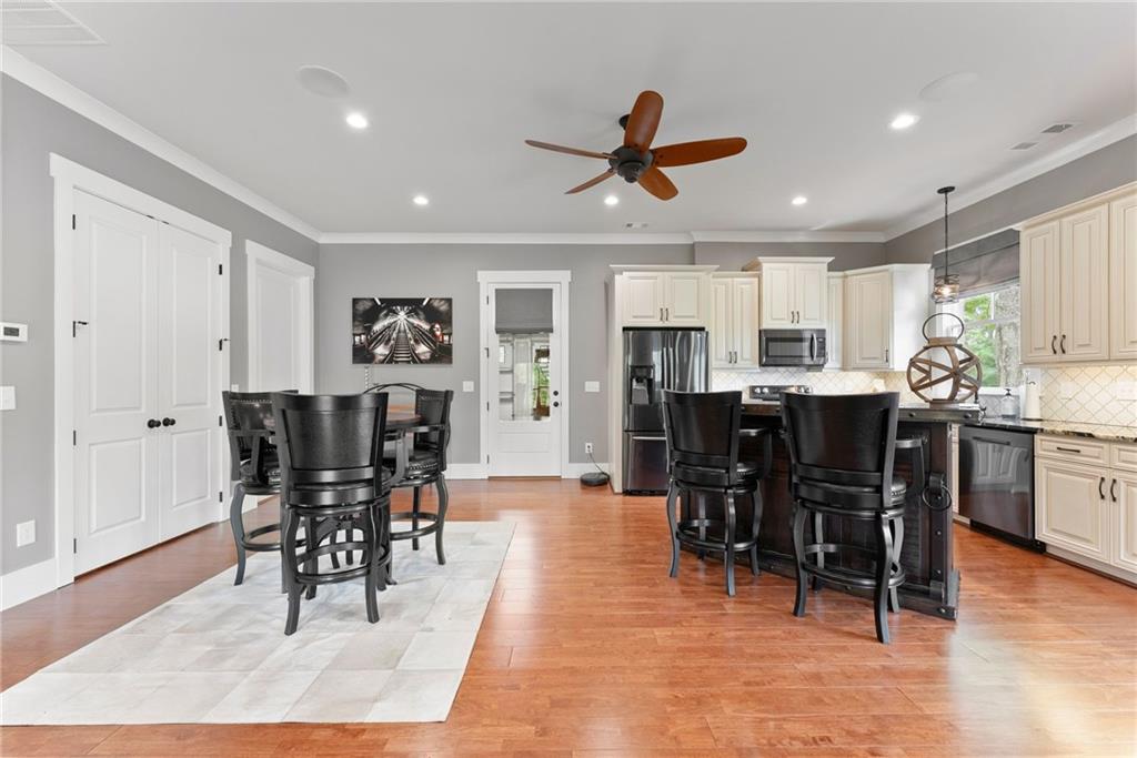 4601 North Browning Bridge Road Gainesville, GA 30506 - Photo 52 of 80 a view of a dining area with furniture