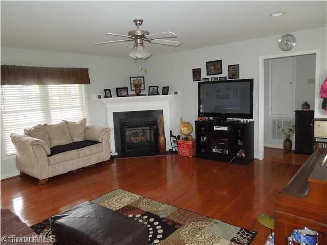 Living Room. Gas Log FP & TV Mantle