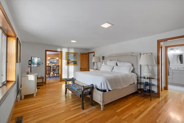 a view of a hallway with furniture and staircase