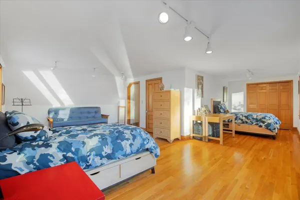 a living room with furniture and large window