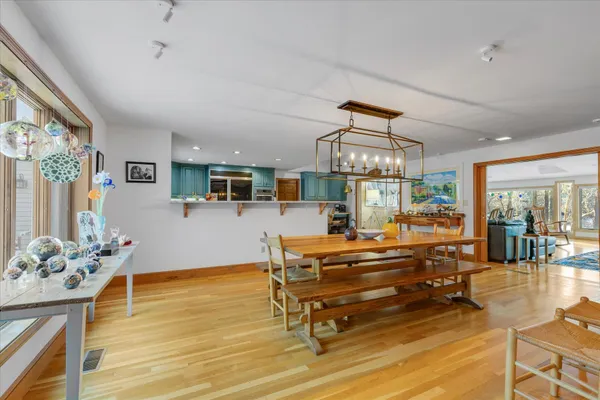 a living room with furniture a rug and a window