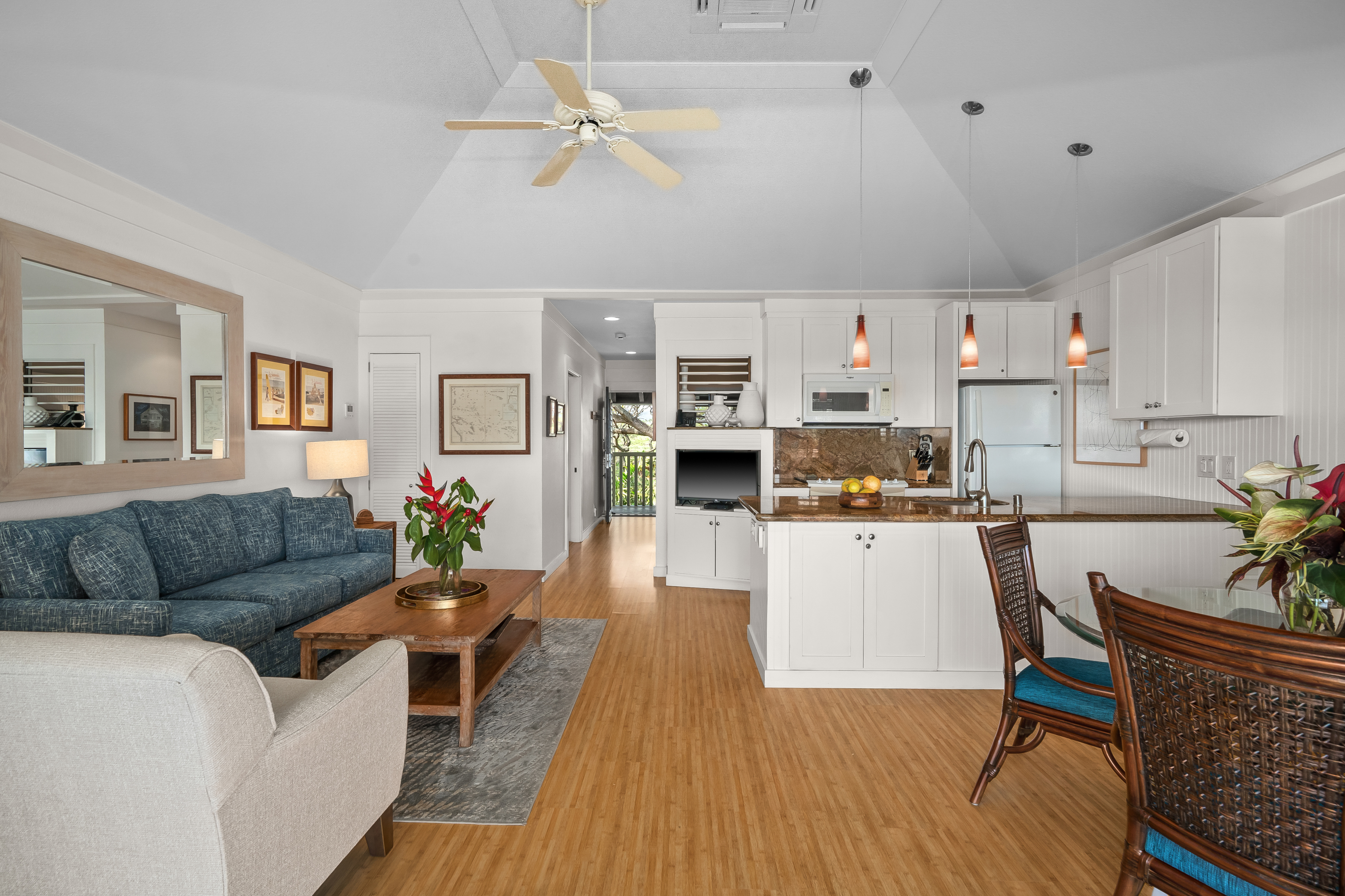 2253 Poipu Road, Unit 123 Koloa, HI 96756 - Photo 15 of 25 a living room with furniture and kitchen view