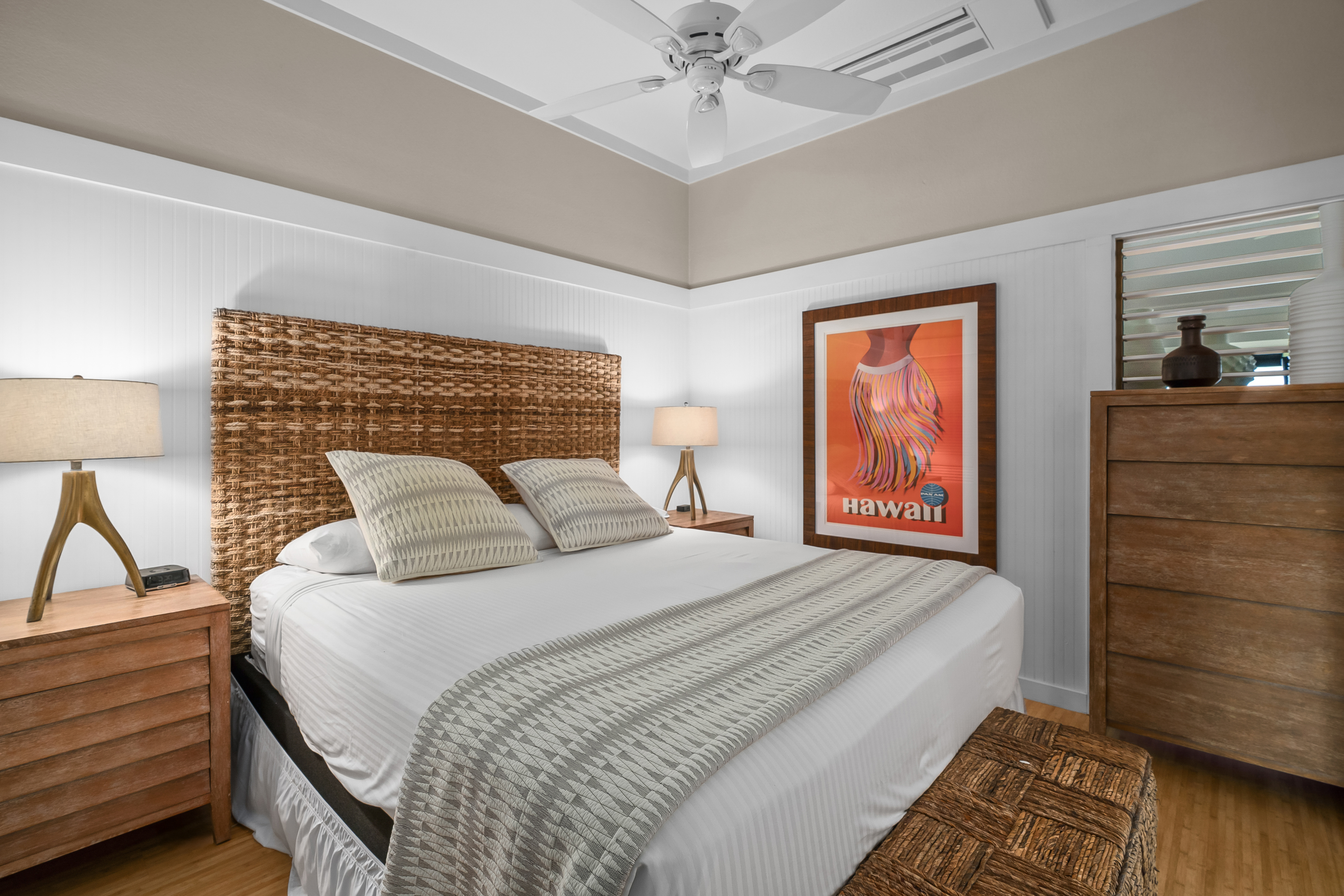 2253 Poipu Road, Unit 123 Koloa, HI 96756 - Photo 17 of 25 a bedroom with a bed and a dresser