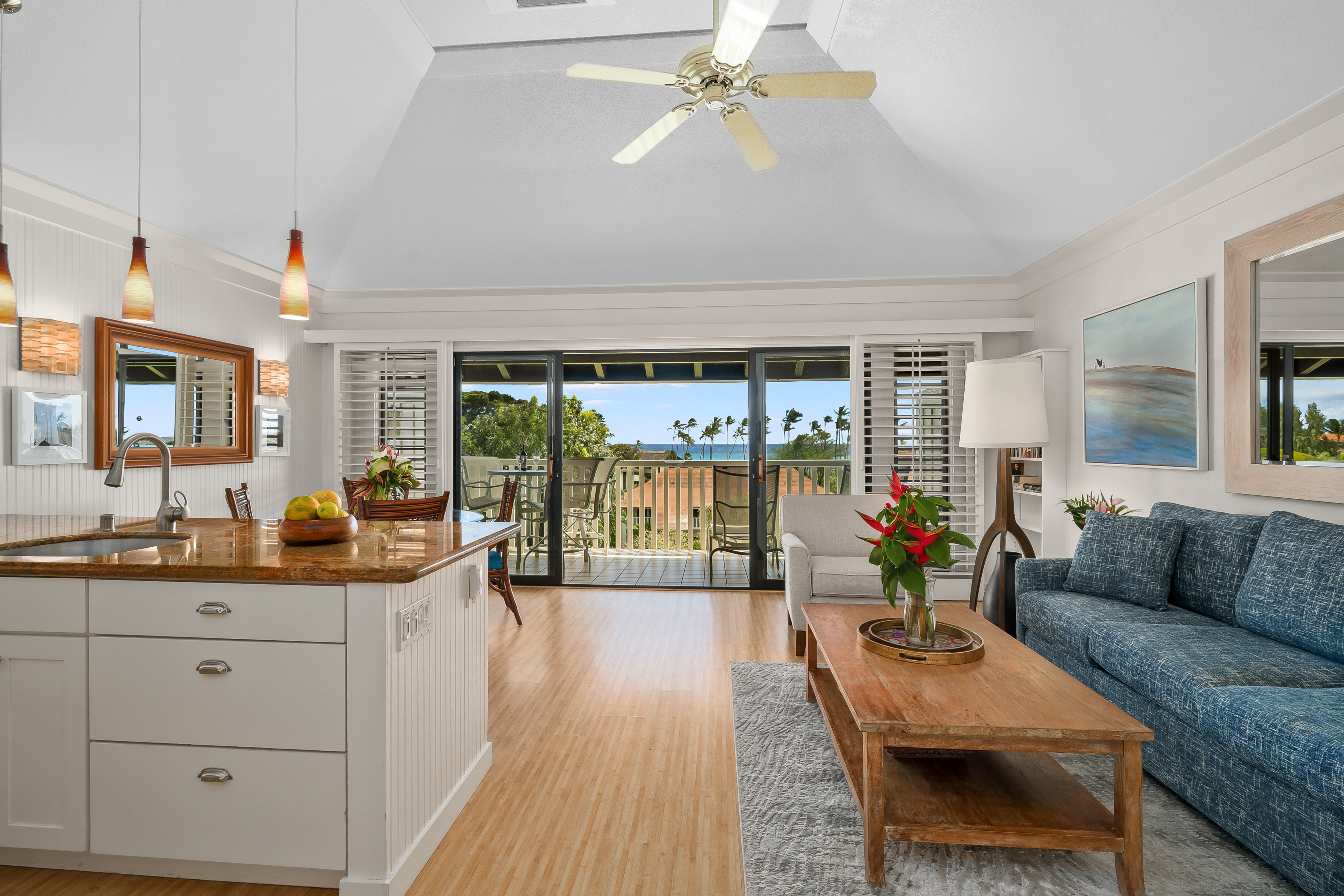 2253 Poipu Road, Unit 123 Koloa, HI 96756 - Photo 2 of 25 a living room with furniture and a large window