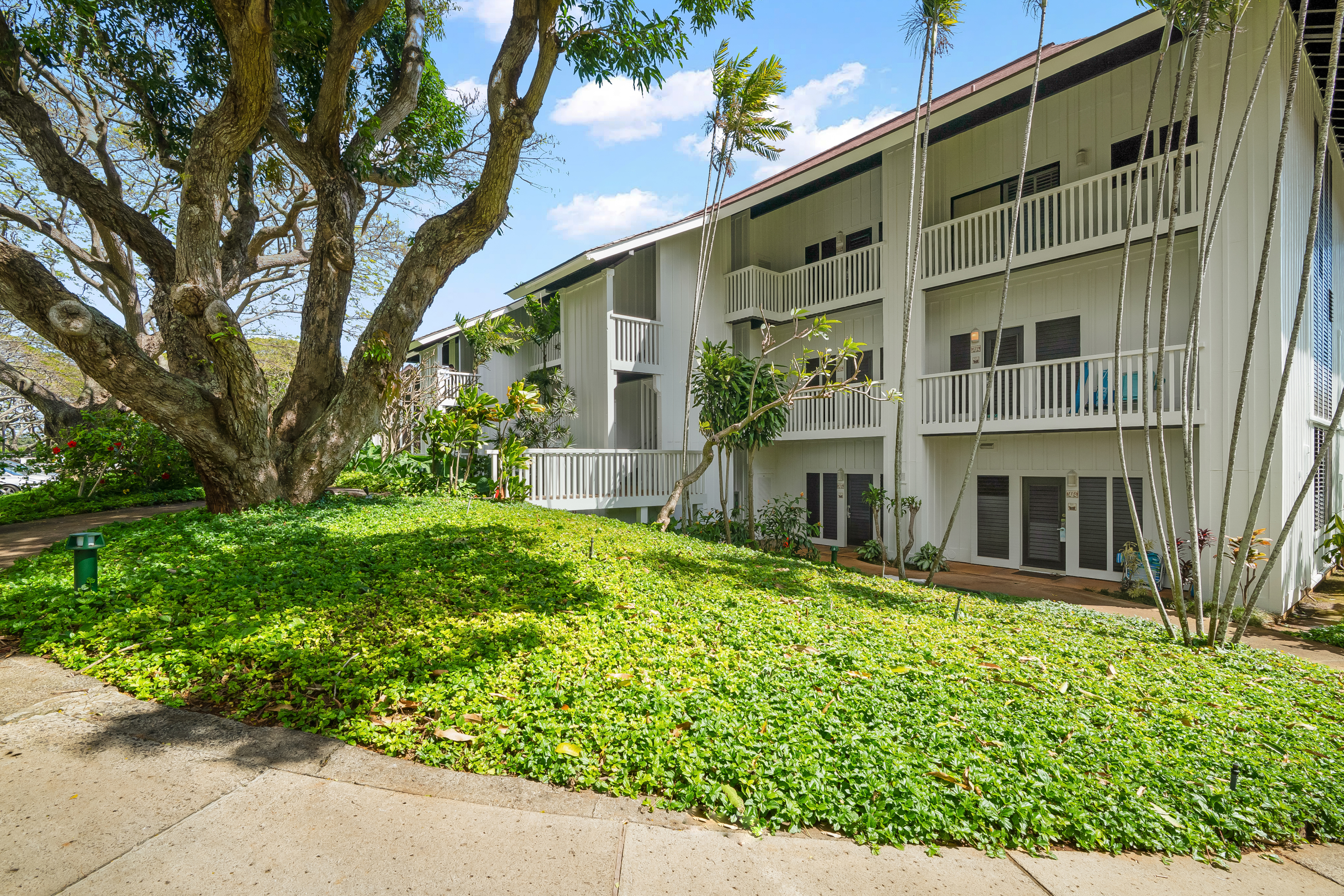 2253 Poipu Road, Unit 123 Koloa, HI 96756 - Photo 25 of 25 front view of a house with a yard
