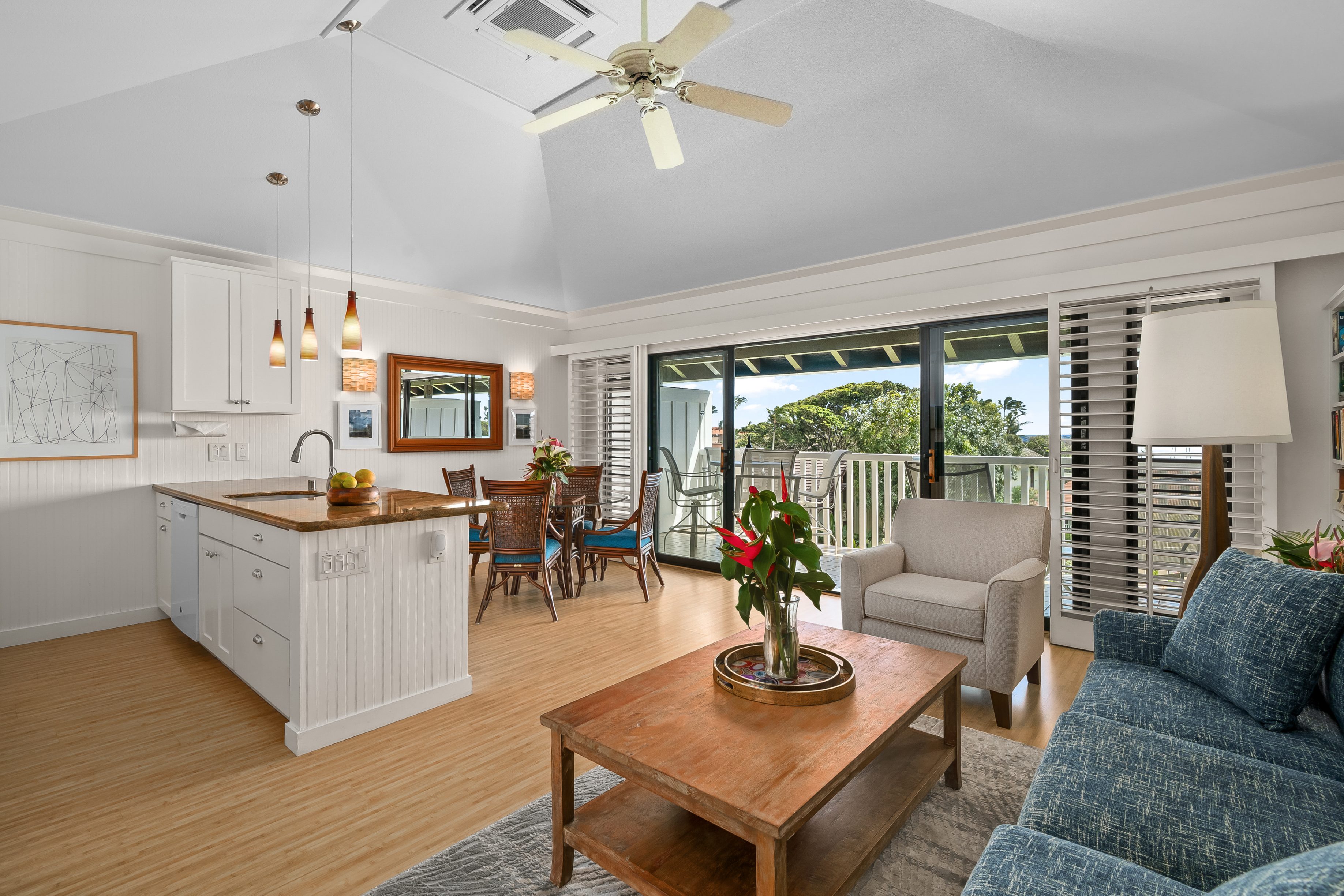2253 Poipu Road, Unit 123 Koloa, HI 96756 - Photo 3 of 25 a living room with furniture and a large window