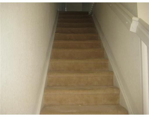 14005 Southwest 49th Street, Unit 9 Miramar, FL 33027 - Photo 4 of 5 a view of staircase with white walls