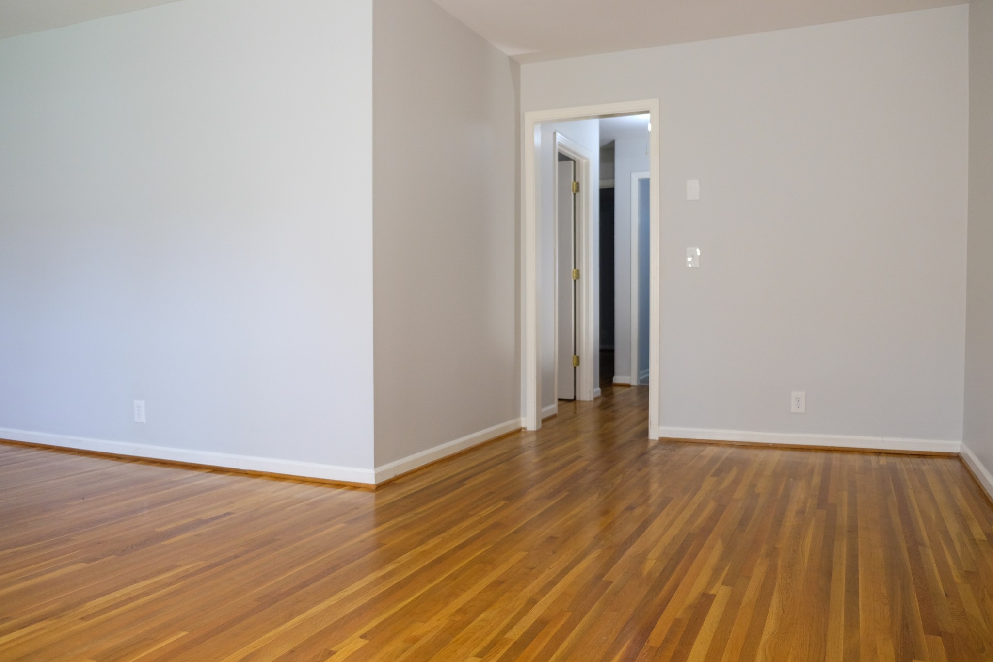 2810 Valley Road Nashville, TN 37215 - Photo 3 of 10 a view of an empty room with wooden floor and closet