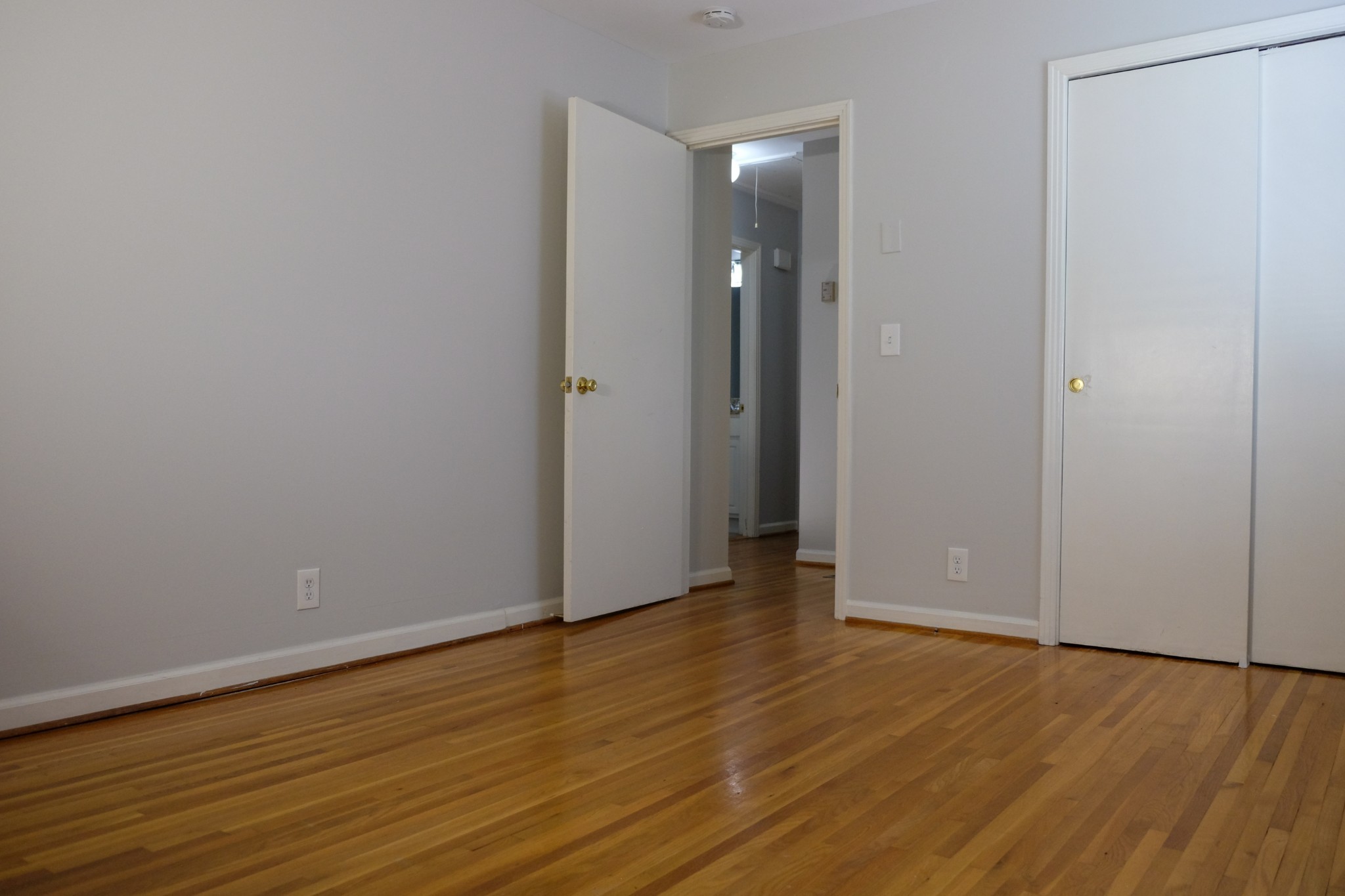 2810 Valley Road Nashville, TN 37215 - Photo 5 of 10 a view of an empty room with wooden floor and closet