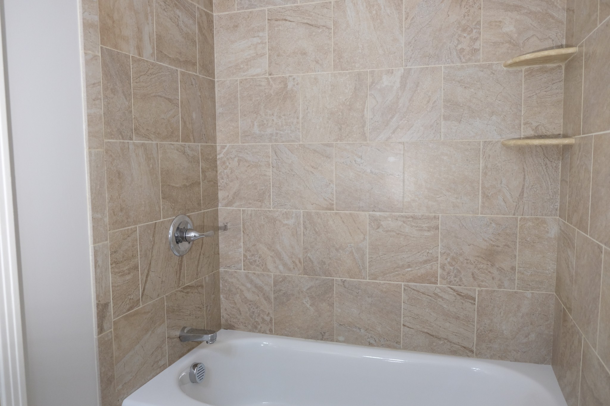 2810 Valley Road Nashville, TN 37215 - Photo 8 of 10 a bathroom with a shower and a bathtub