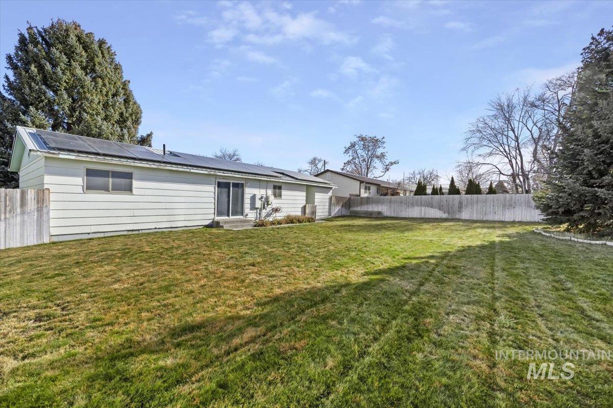 125 Sunset Circle Buhl, ID 83316 - Photo 15 of 17 Rear view of house with solar panels and entry steps