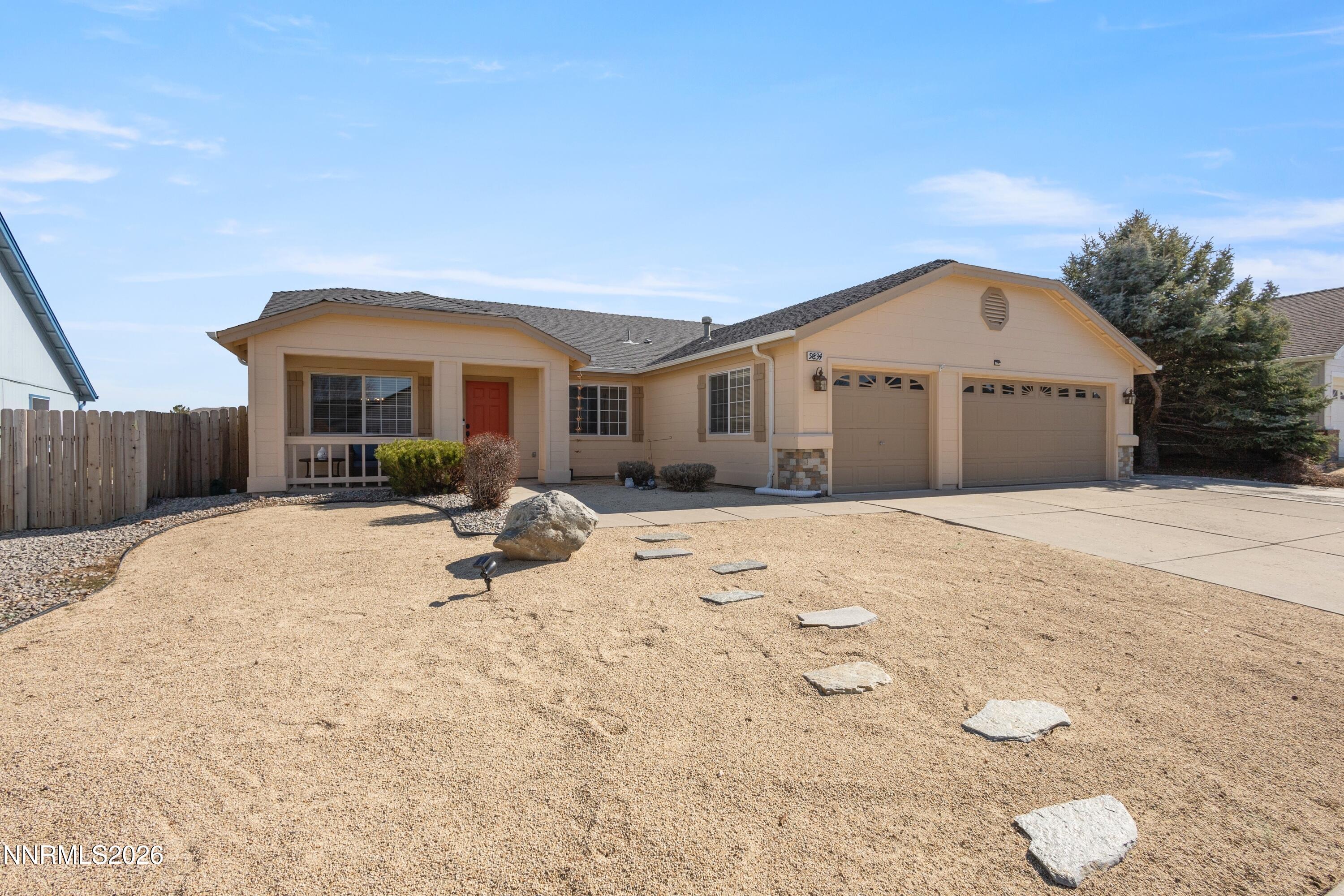 a view of a house with wooden roof and sitting area