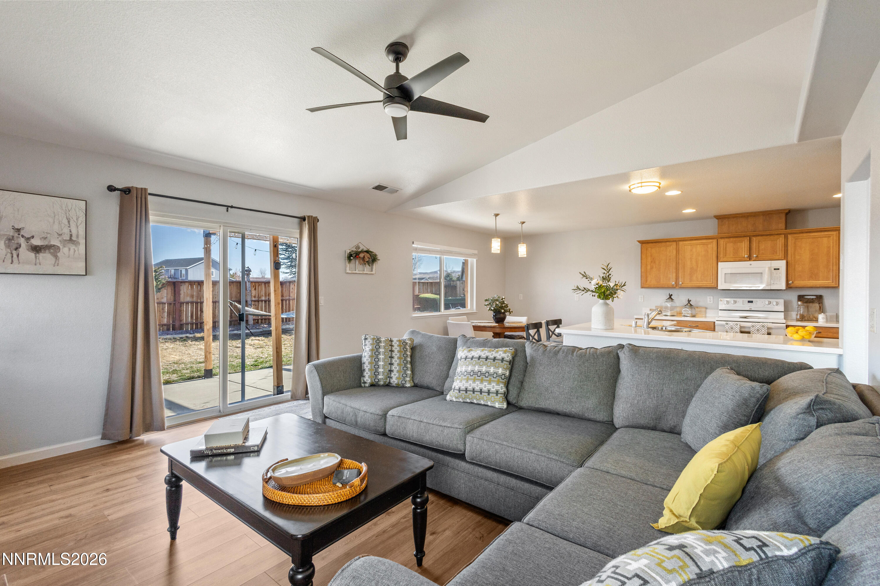 9834 Suncrest Drive Reno, NV 89506 - Photo 13 of 32 a living room with furniture wooden floor and a window