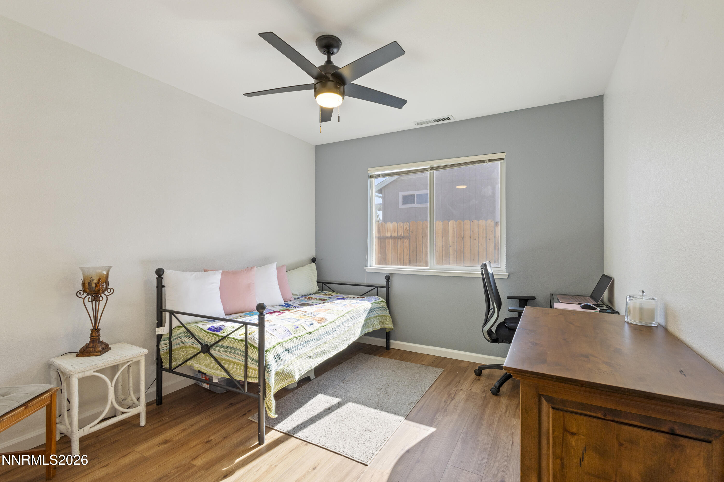 9834 Suncrest Drive Reno, NV 89506 - Photo 20 of 32 a living room with a window
