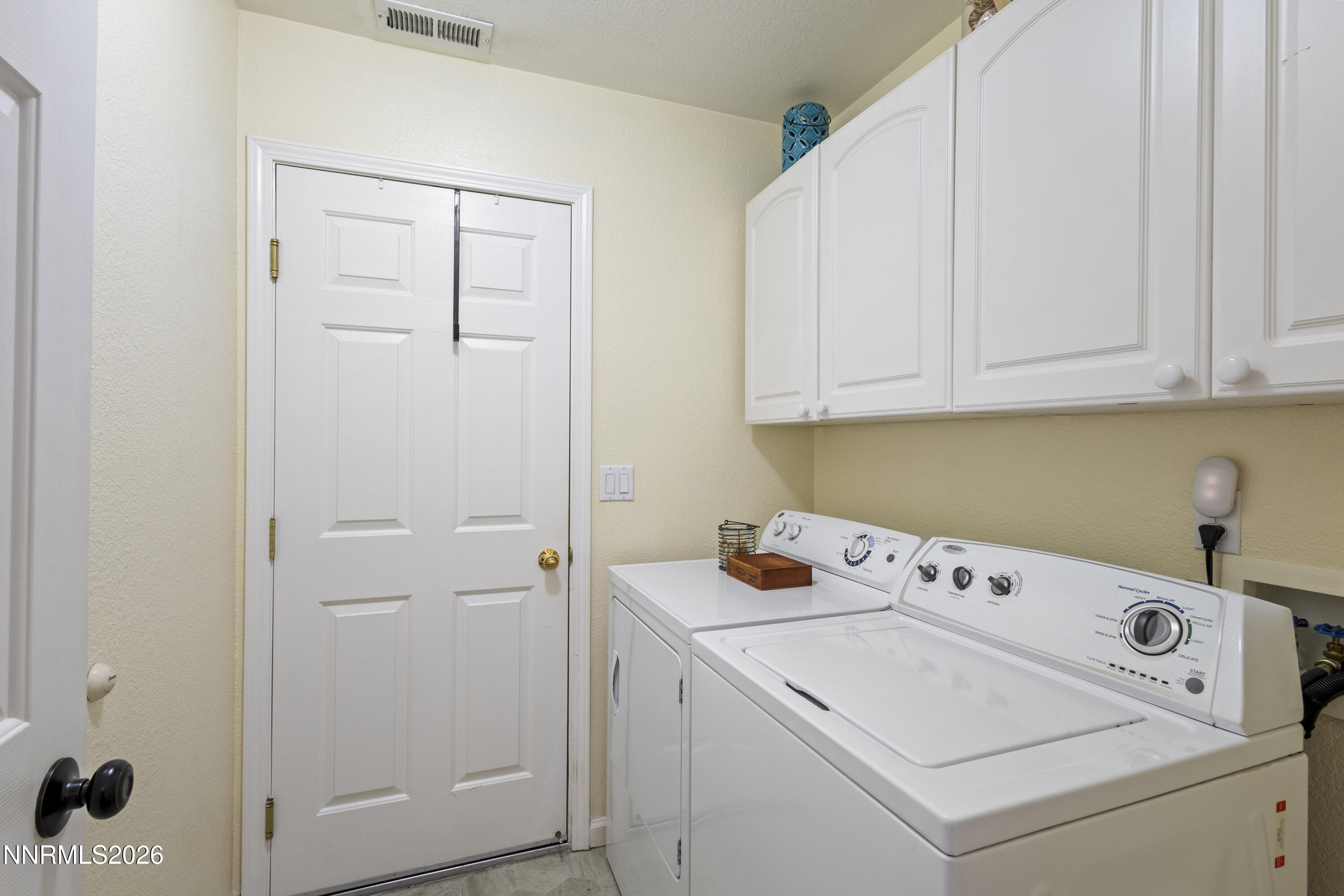 9834 Suncrest Drive Reno, NV 89506 - Photo 24 of 32 a utility room with dryer and washer