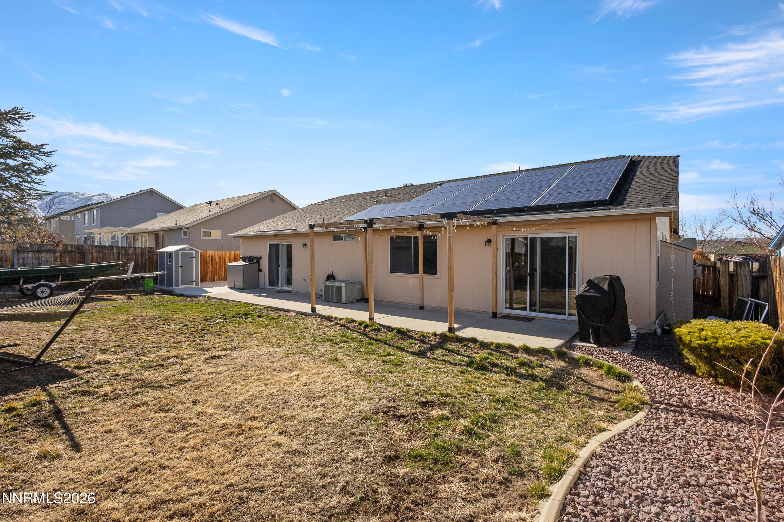 9834 Suncrest Drive Reno, NV 89506 - Photo 26 of 32 a front view of a house with a yard
