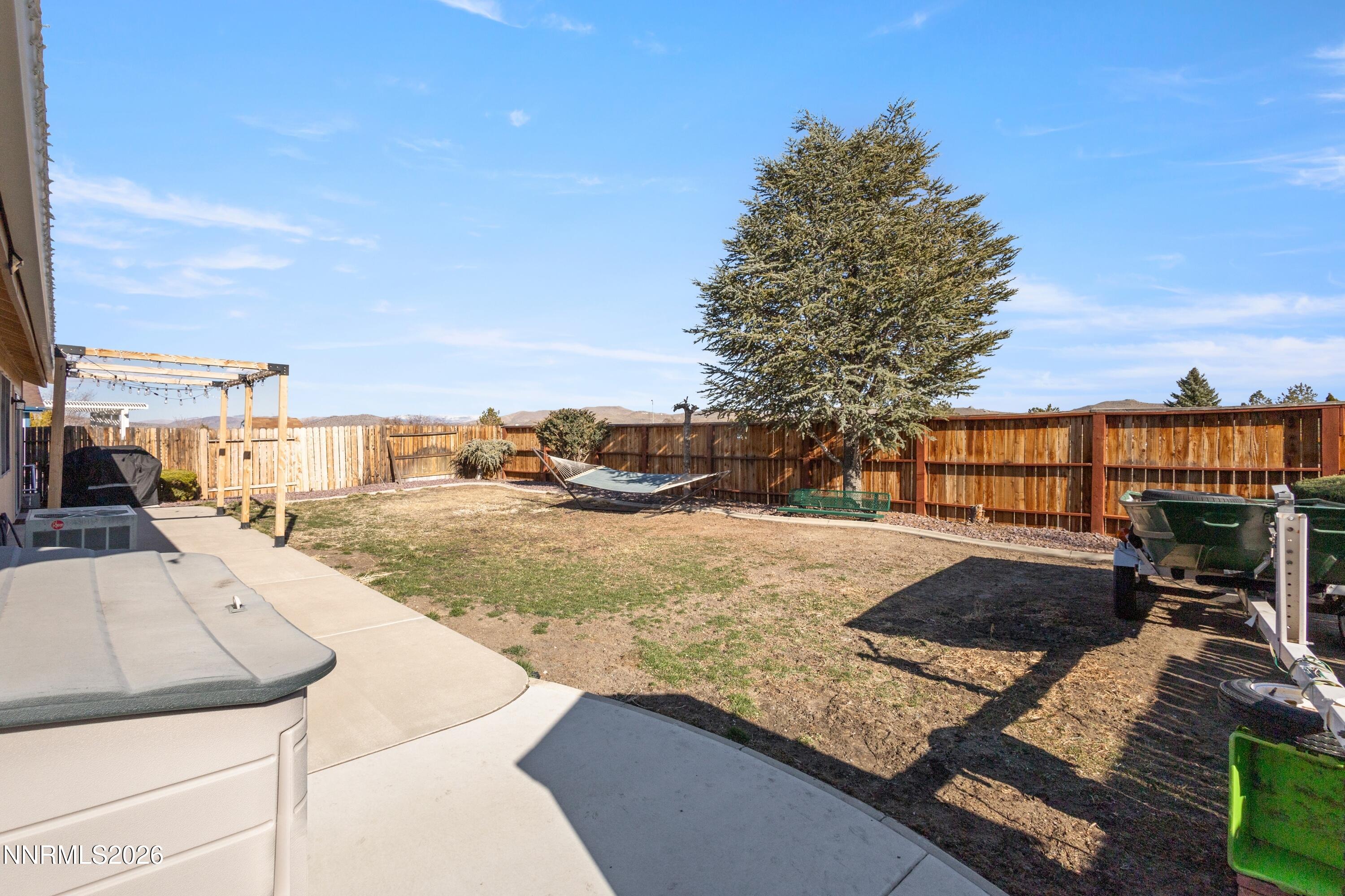 9834 Suncrest Drive Reno, NV 89506 - Photo 27 of 32 a view of a swimming pool with a lounge chairs