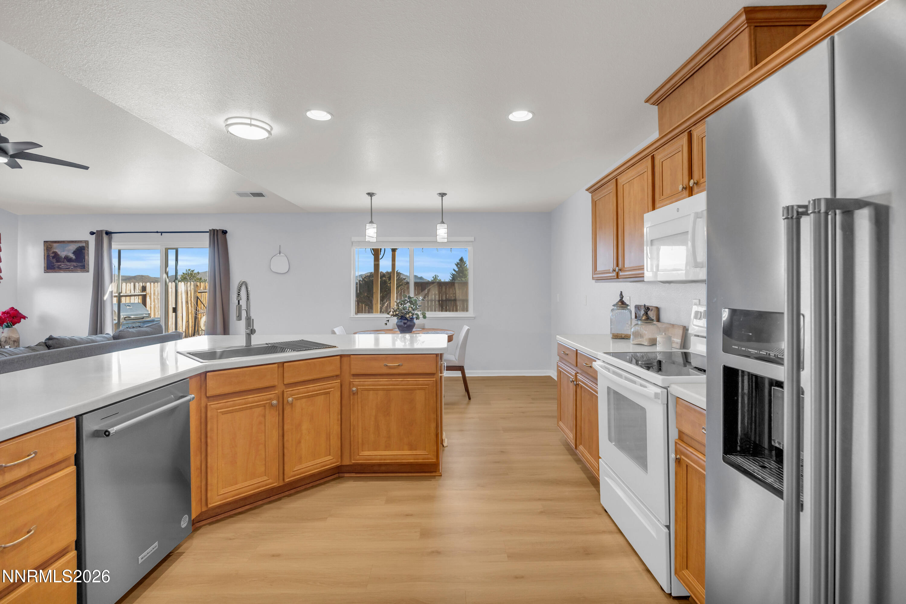 9834 Suncrest Drive Reno, NV 89506 - Photo 8 of 32 a large kitchen with stainless steel appliances lots of counter top space