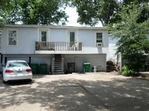 a front view of a house with a garage