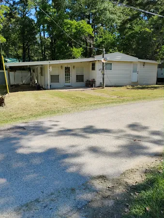a view of a house with a swimming pool