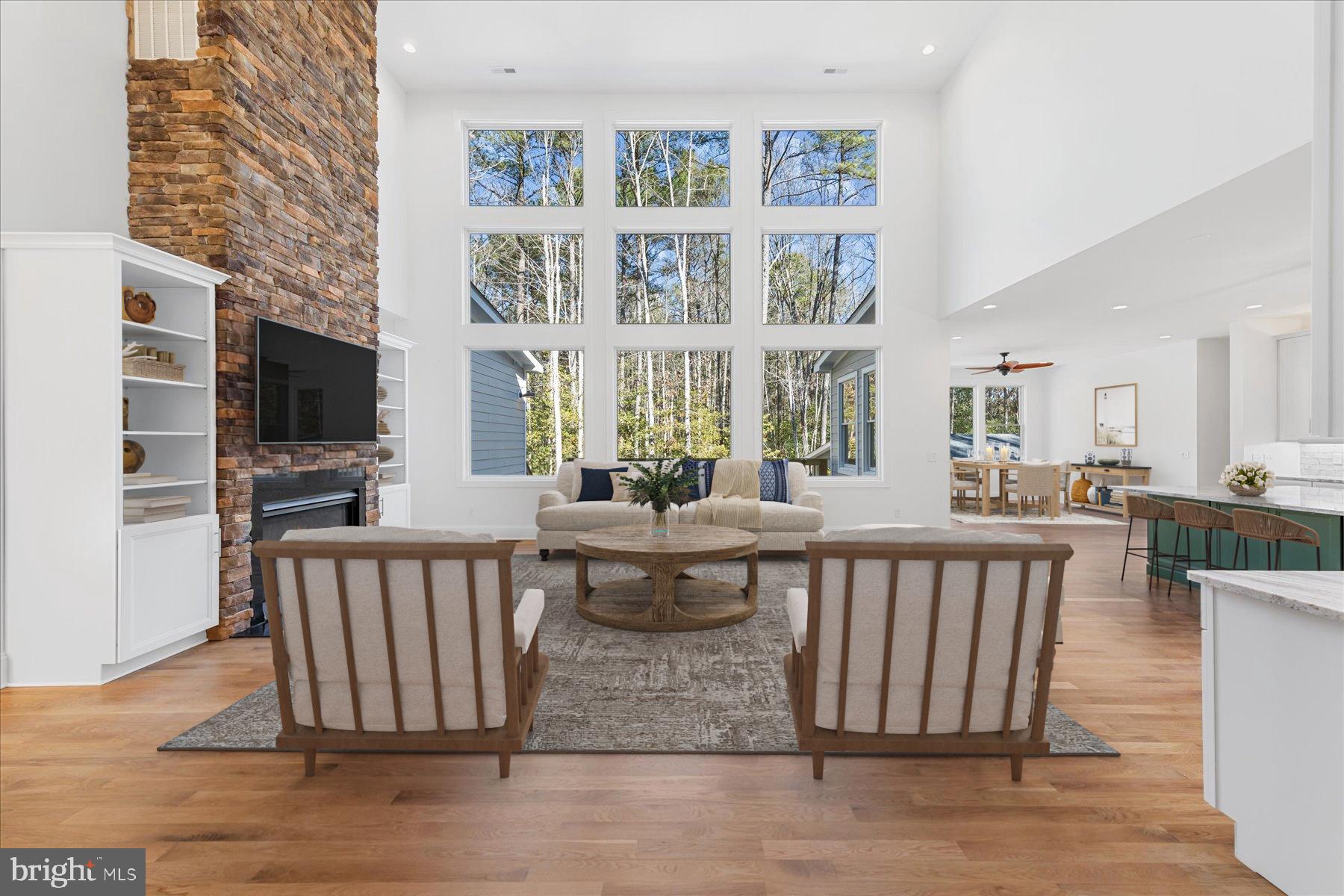 30425 Hollymount Road Harbeson, DE 19951 - Photo 13 of 98 a living room with furniture a rug and a flat screen tv