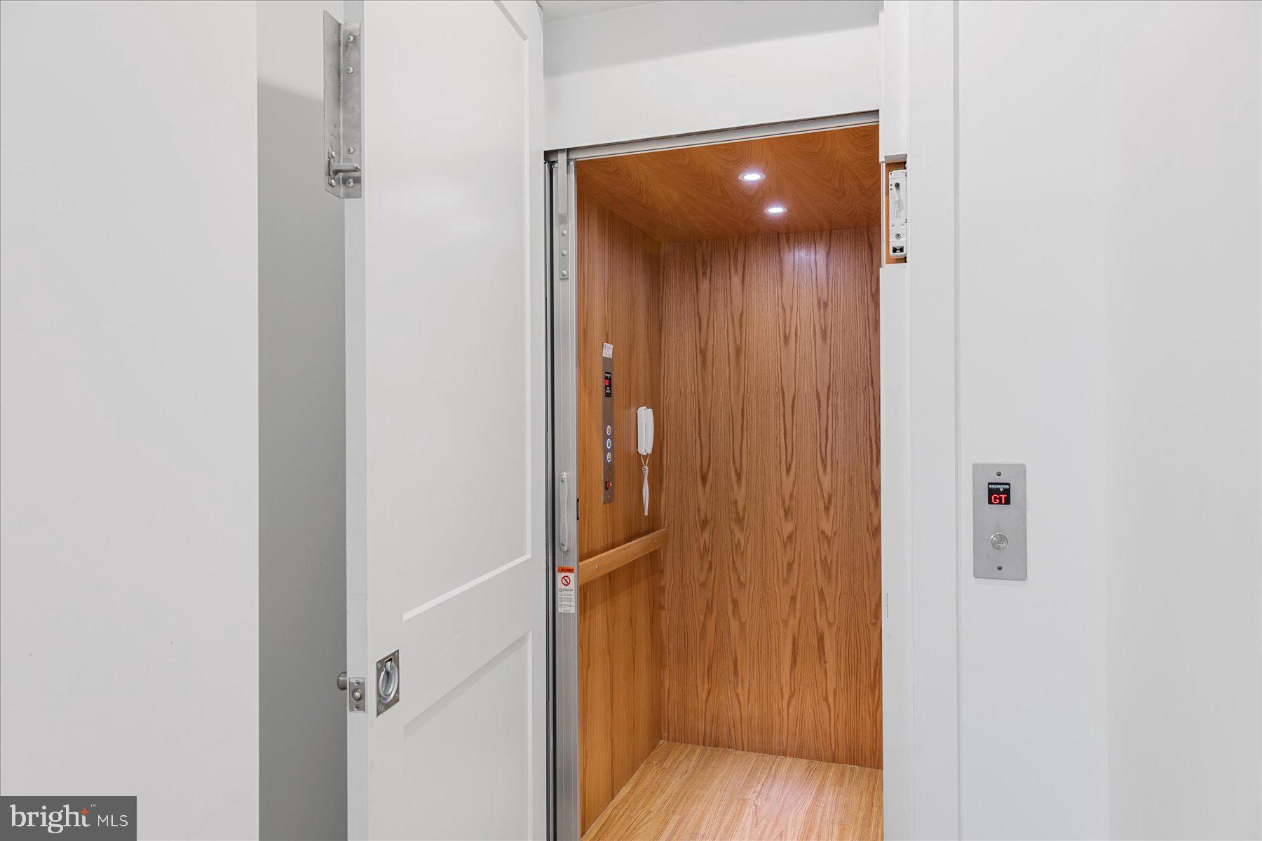 30425 Hollymount Road Harbeson, DE 19951 - Photo 34 of 98 a view of a hallway with wooden floor