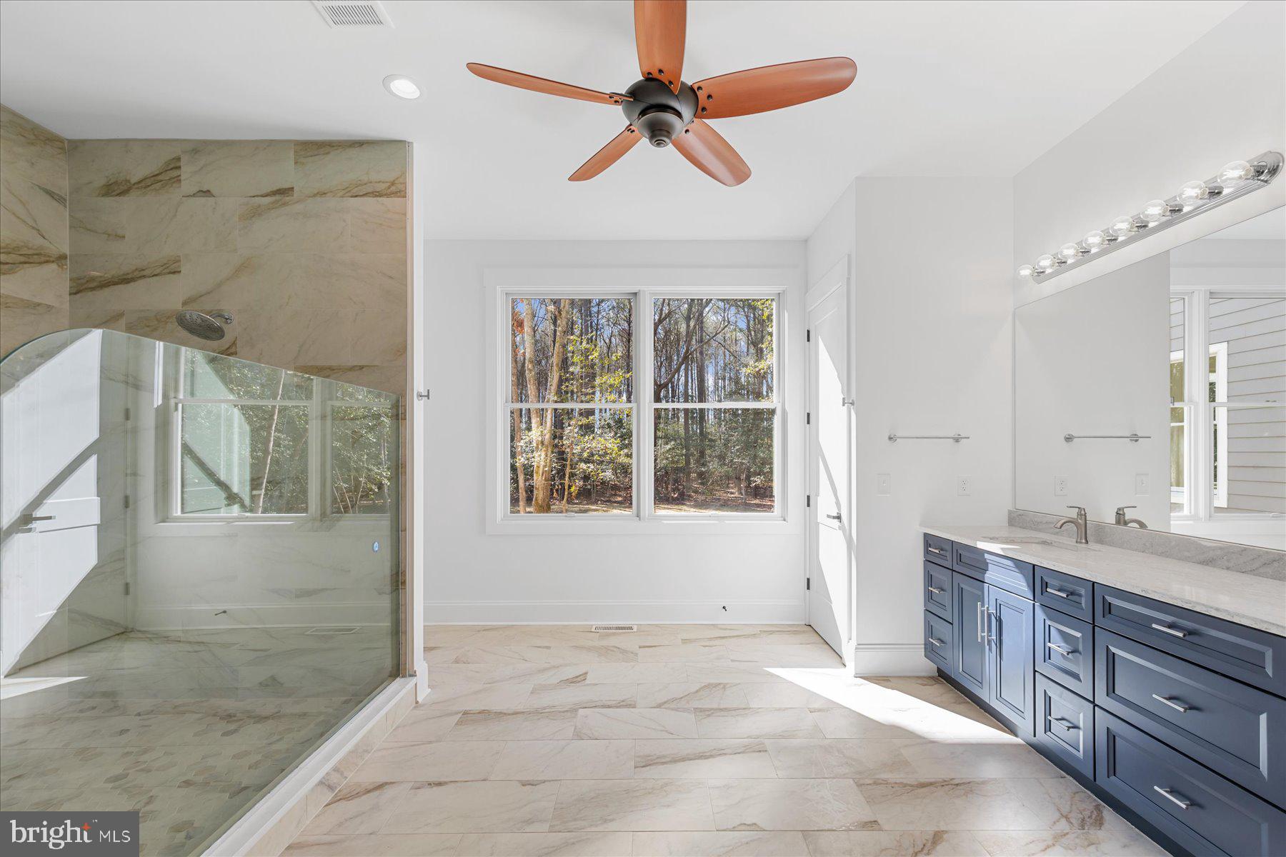 30425 Hollymount Road Harbeson, DE 19951 - Photo 40 of 98 Main level primary ensuite bath