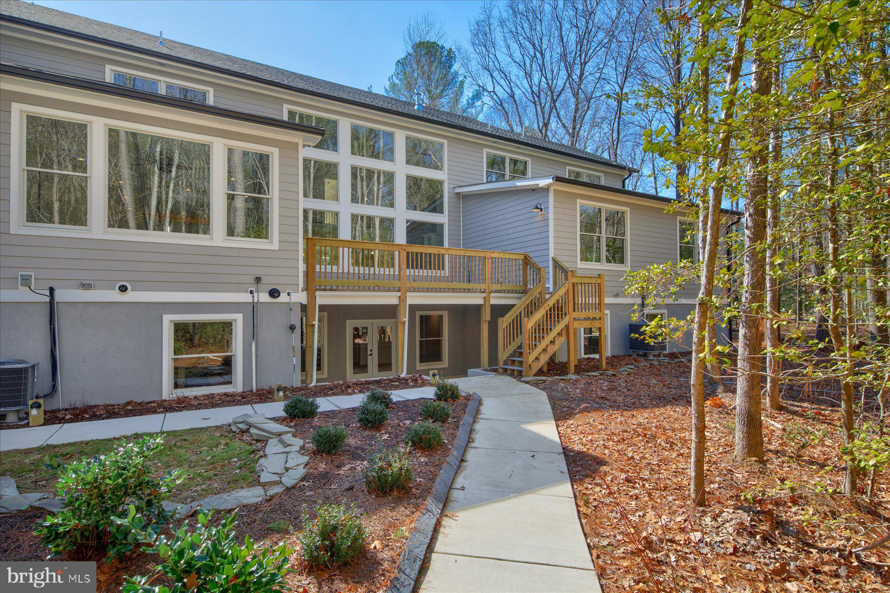 30425 Hollymount Road Harbeson, DE 19951 - Photo 4 of 98 a front view of a house with a yard